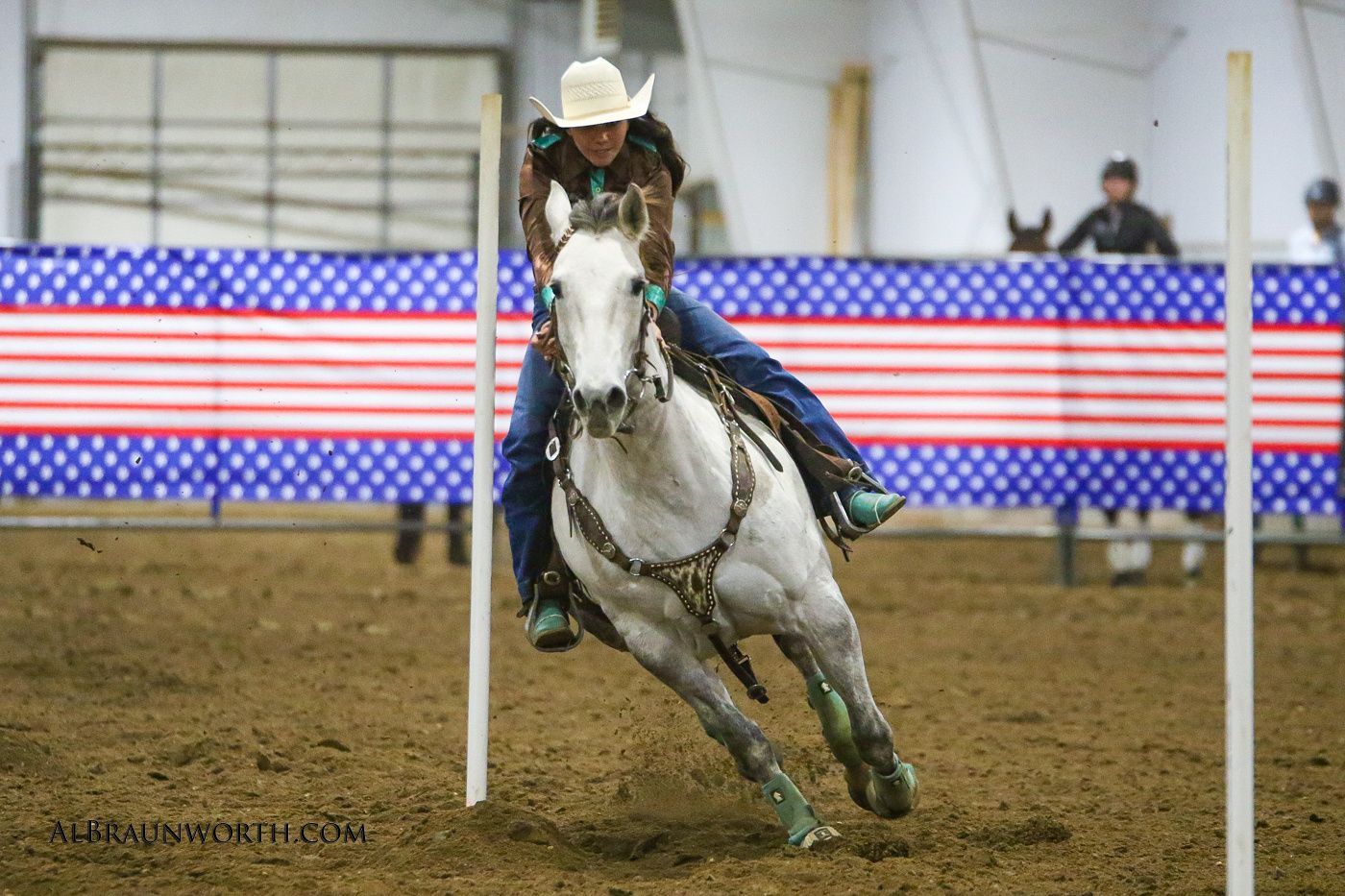 Running the poles in front of a full arena
